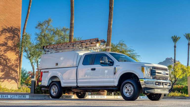 SpaceKap service body on a full-size pickup truck for building maintenance