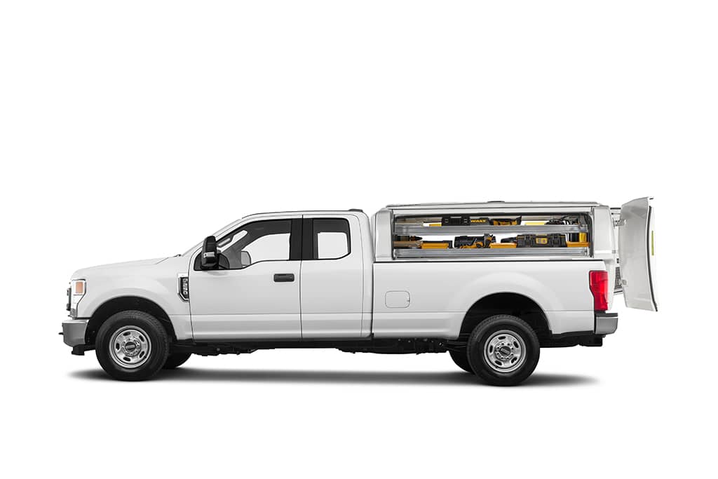 SpaceKap Compak fiberglass service body with open compartments showing organized tools